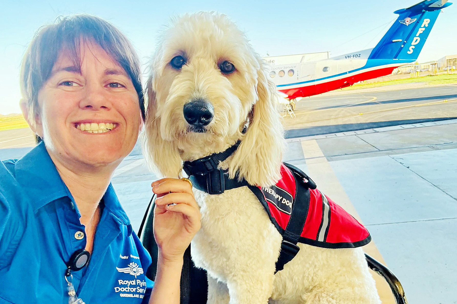 Jamie-Lee with her popular therapy dog Lulu, who has started school visits.