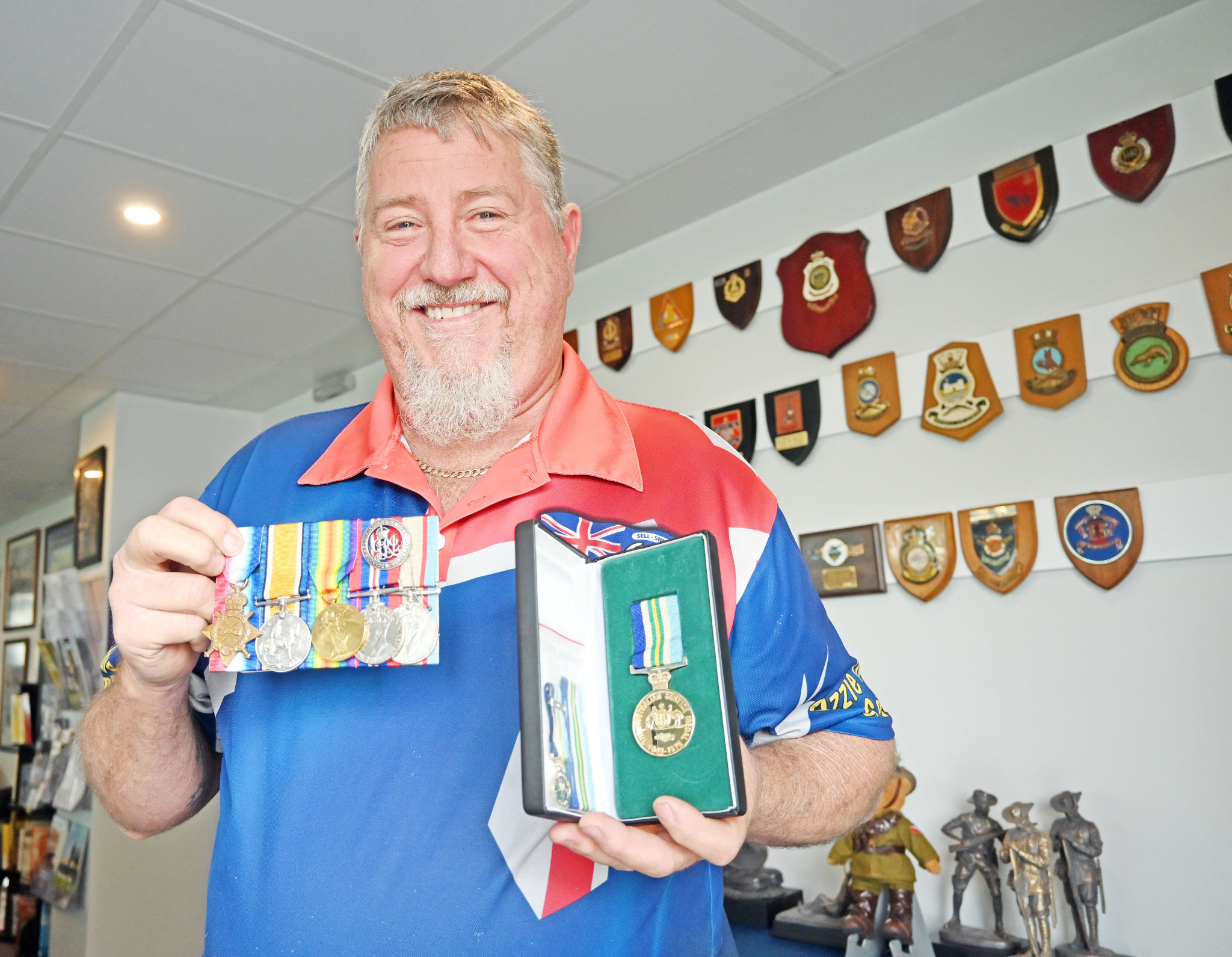 Johno Davies has loaned more than 100 military pieces for the RSL display, including a medal issued for his stepfather’s service in New Guinea.