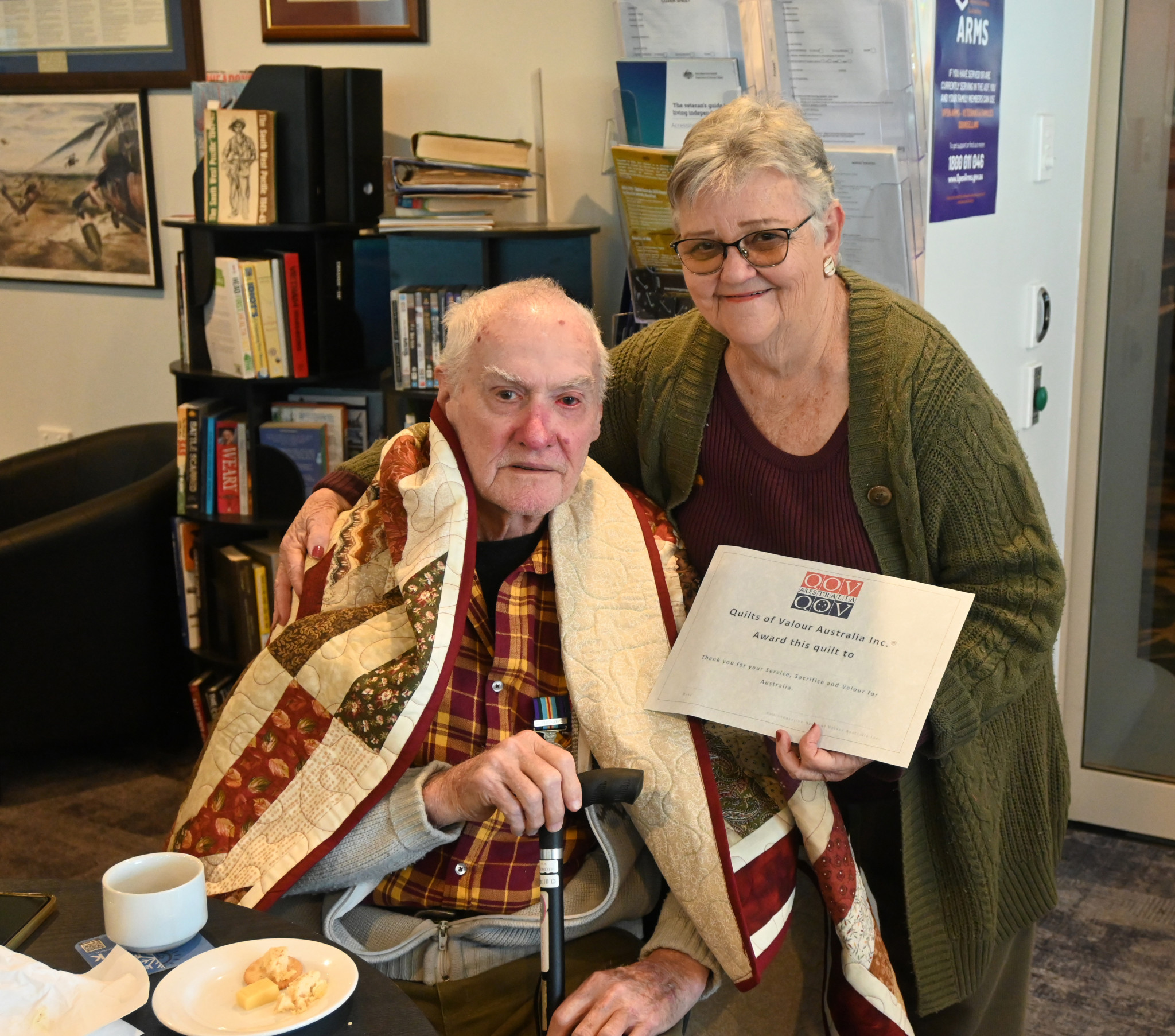 Mount Isa RSL stalwart Bill Hilton and his wife Lorraine after the Vietnam veteran was presented with a Quilt of Valour in the room named in his honour.