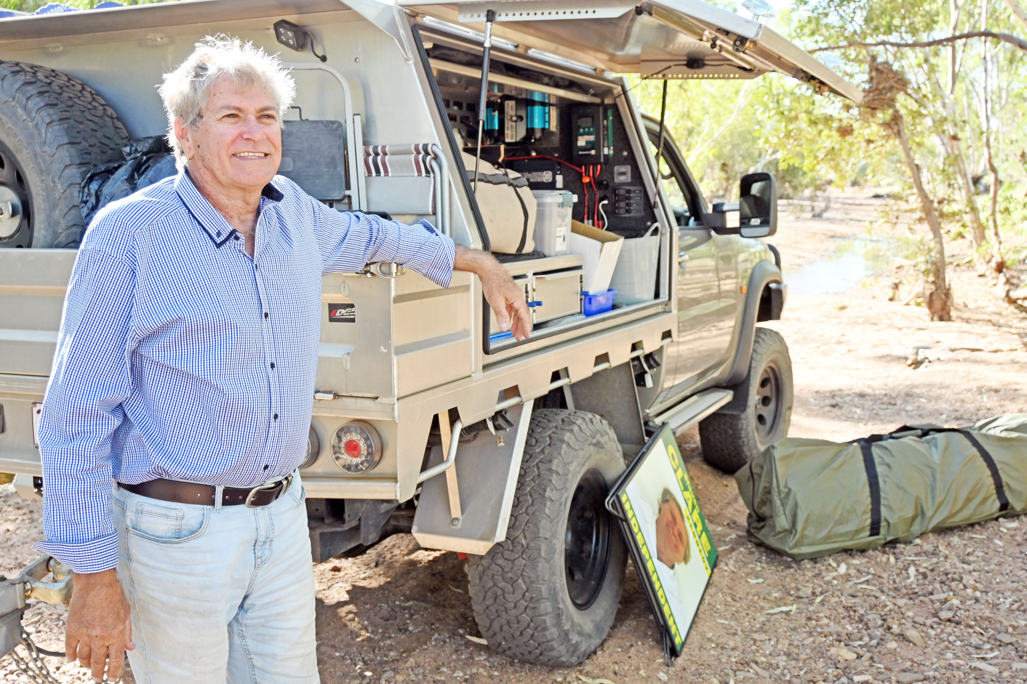 Steven Clare camped on the outskirts of Mount Isa for a week to help keep costs down in his one-man campaign.