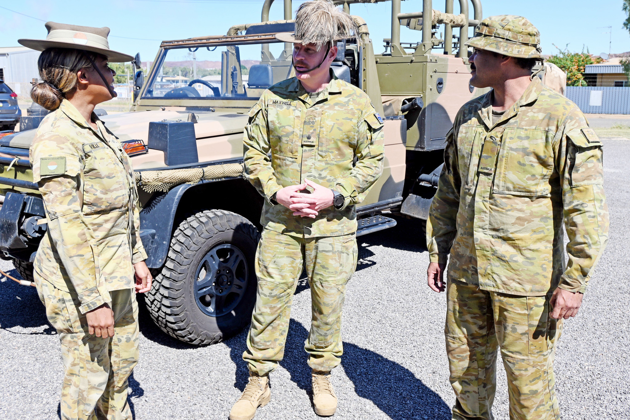 Corporal Tara Neville, Major Scott Maxwell and Private Lleyton Major at the Mount Isa barracks along Ryan Road.