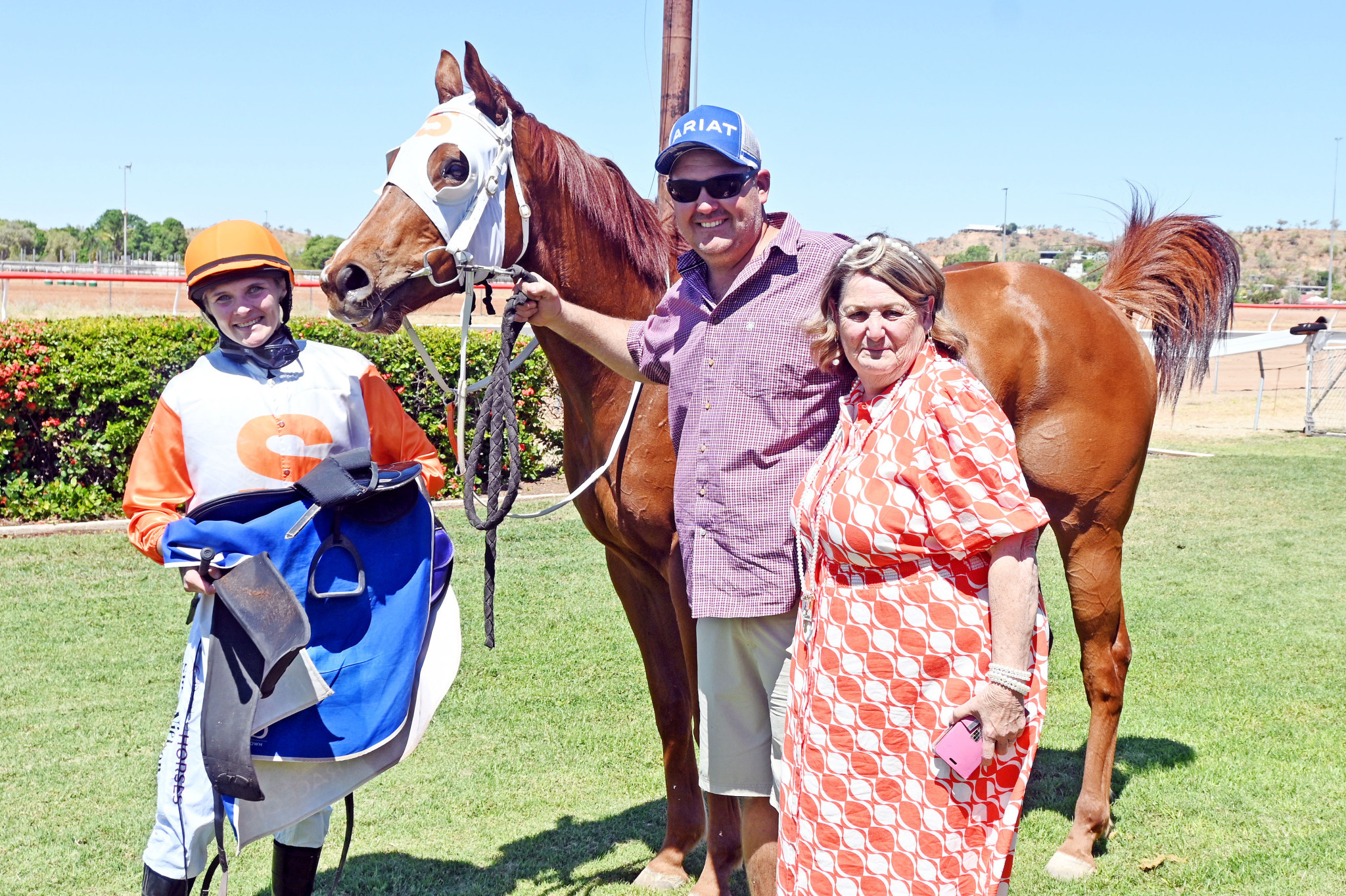 Jockey Shae Nielson, trainer Jay Morris and owner Lenore Saunders with Le Weasel.