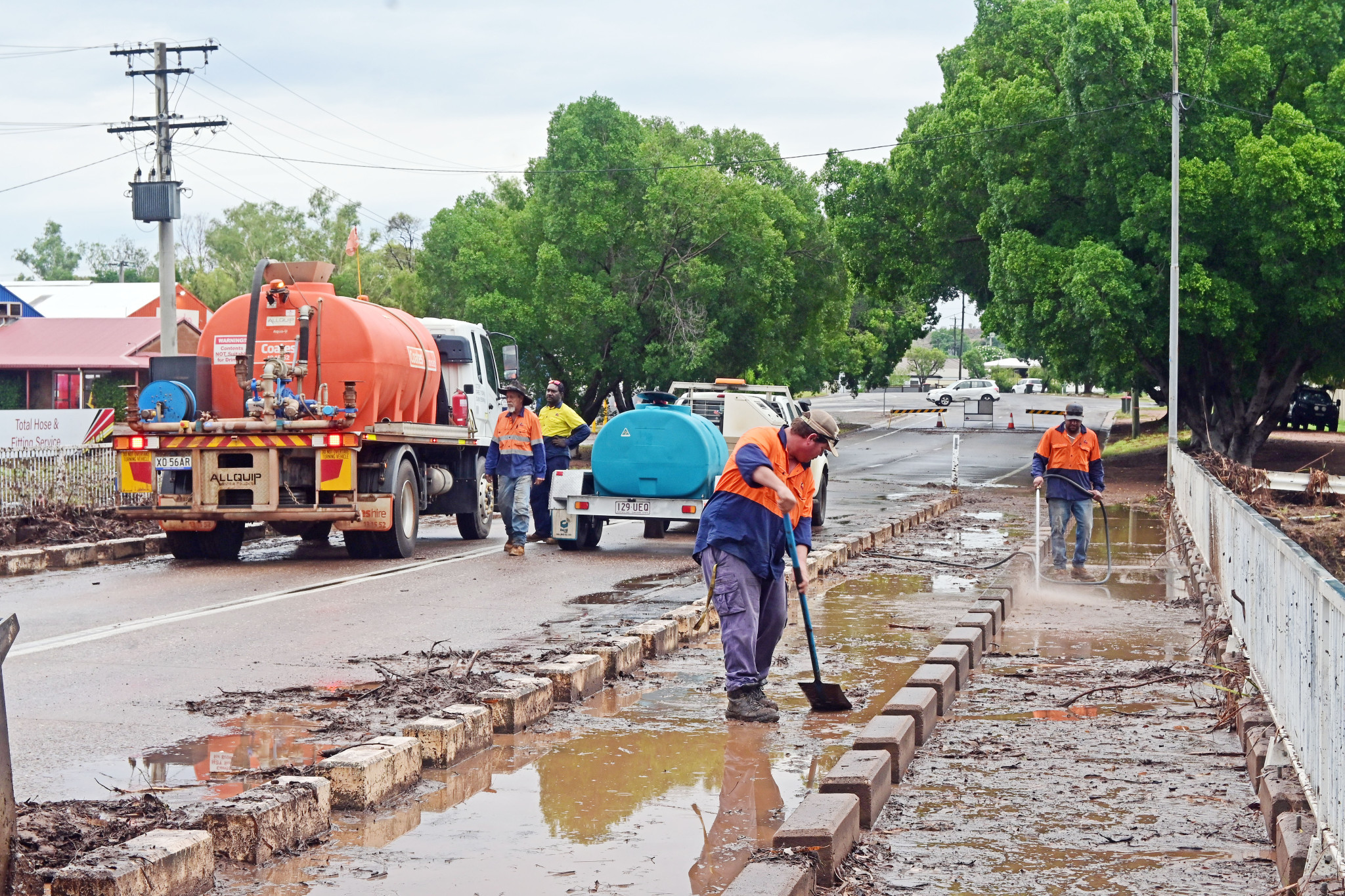 Mount Isa City Council workers were on the scene early on Friday morning to clean up debris along the Sunset Bridge.