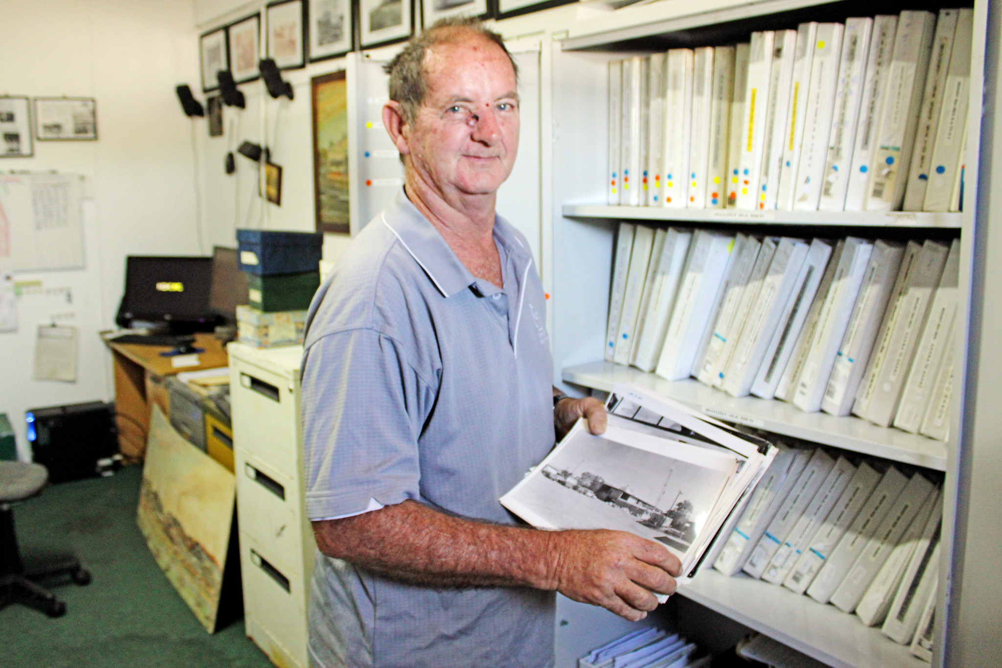 Brian Adamson at his West Street office where he is painstakingly cataloguing more than 450,000 photo negatives.