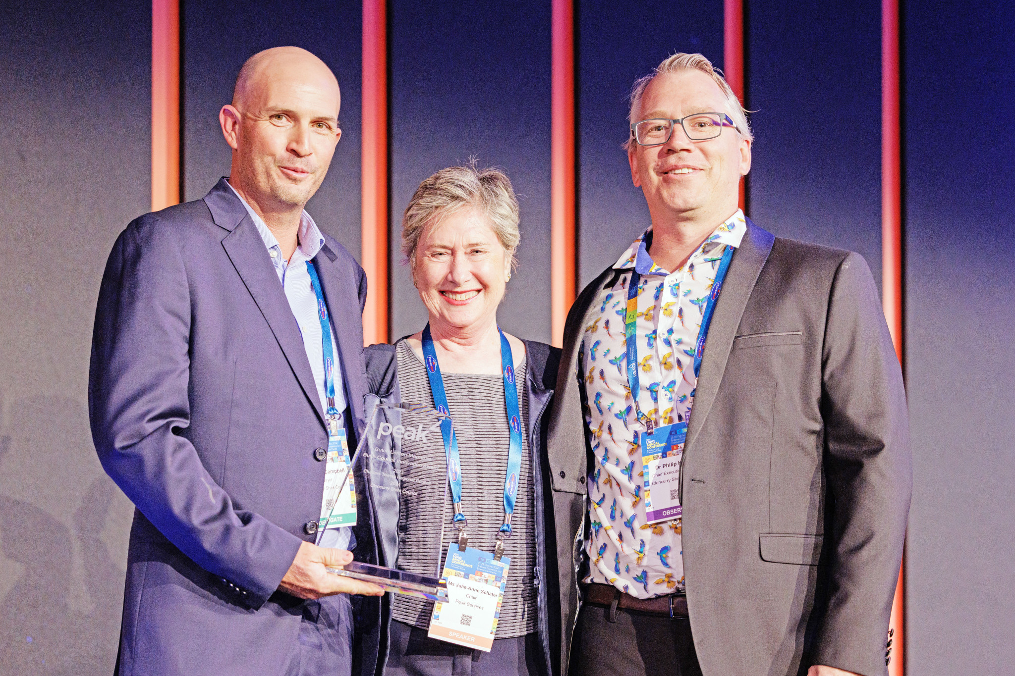 Cloncurry mayor Greg Campbell and CEO Philip Keirle receive the Butch Lenton Memorial Bush Council Innovation Award from Peak Services’ Julie-Anne Schafer.