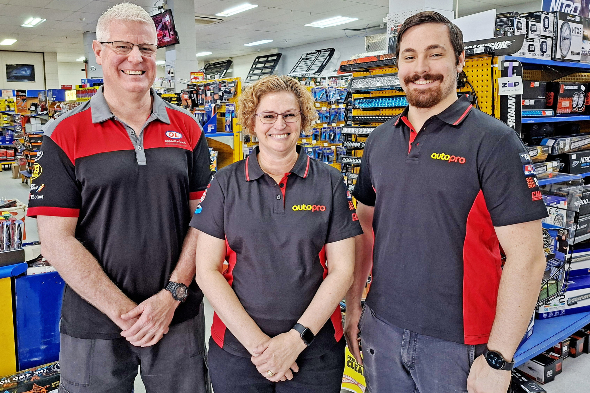 Mount Isa Autopro’s Kevin and Nikki Rowsell and their son Anthony in the new-look store after it was rebranded last week.