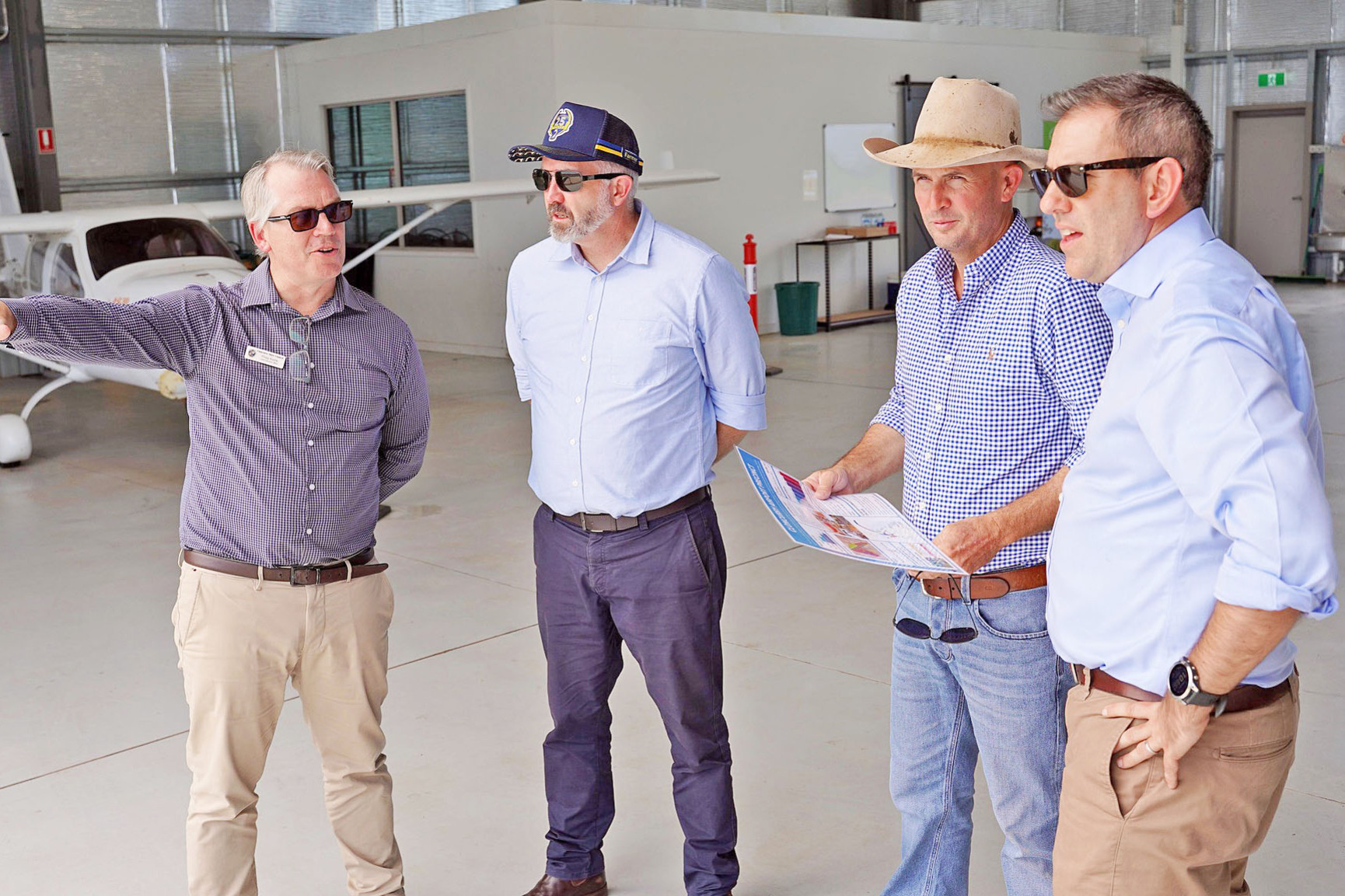 Cloncurry Shire CEO Philip Keirle, Senator Anthony Chisholm, mayor Greg Campbell and Treasurer Jim Chalmers at the Cloncurry Airport in December last year.