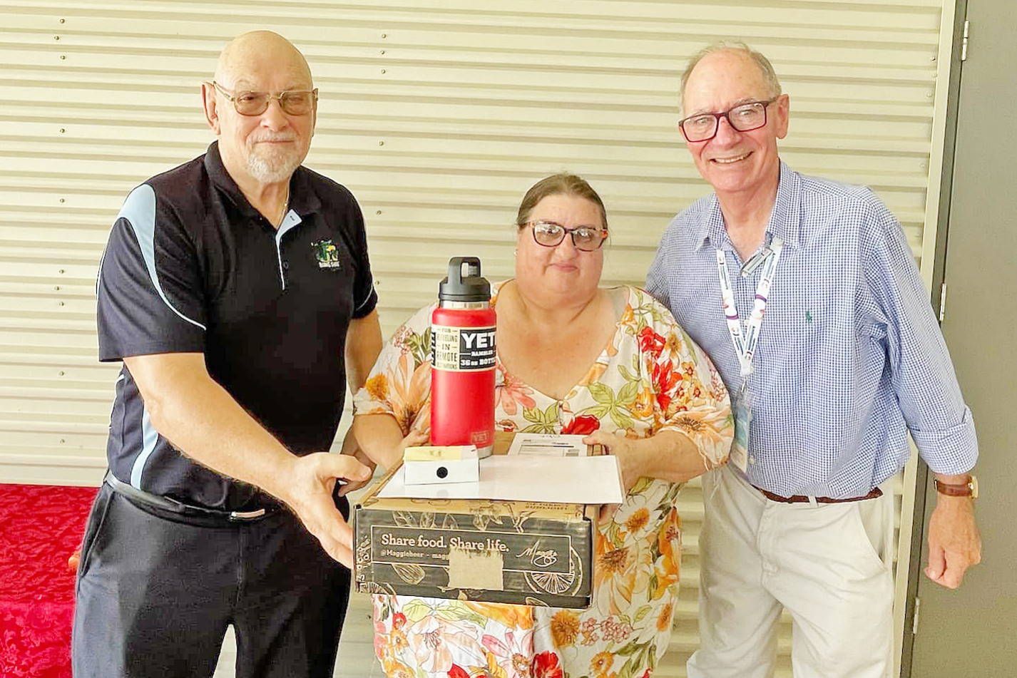 Burke Shire’s Community Champion of the Year Kylie Camp is presented with her award by council CEO Dan McKinlay (left) and Burke Shire’s Australia Day ambassador Ross McKinnon.