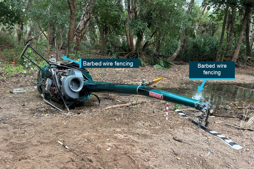 The image provided by the Australian Transport Safety Bureau shows the wreckage of the helicopter.