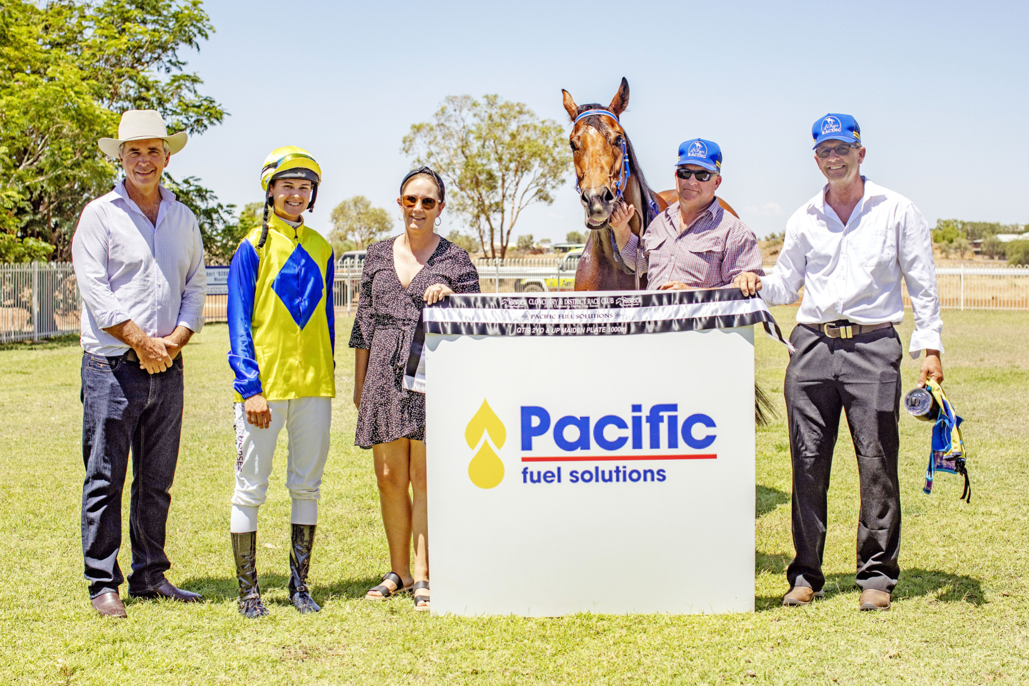 Jockey Mel Campbell with trainer Terry Hall, sponsors and connections of The Carpenter after his win on Saturday.