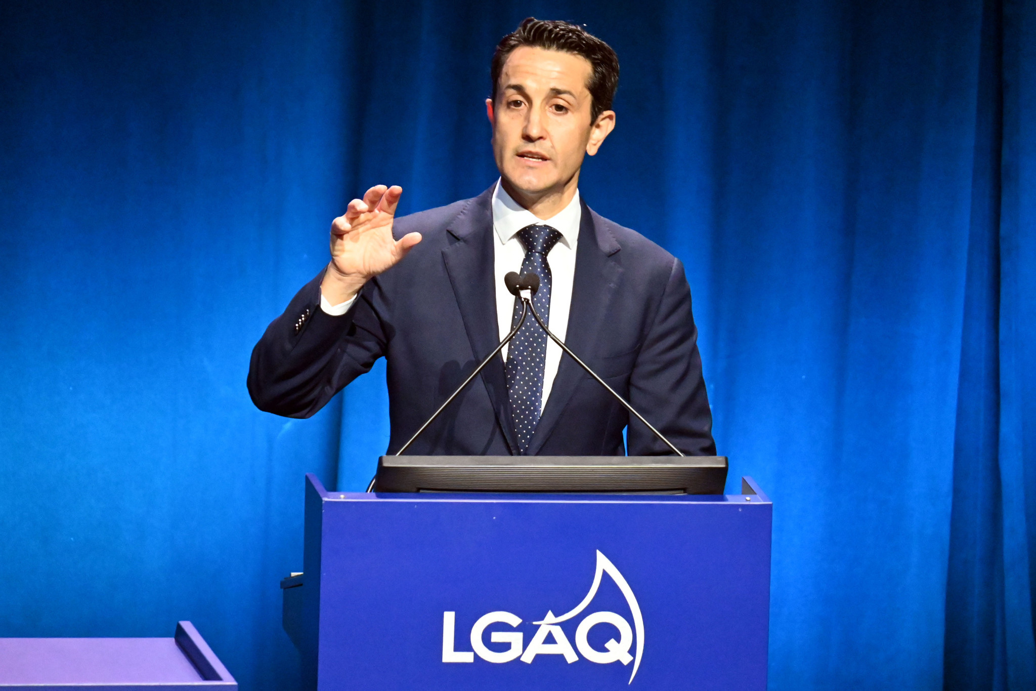 Premier David Crisafulli addresses the LGAQ conference on Tuesday.