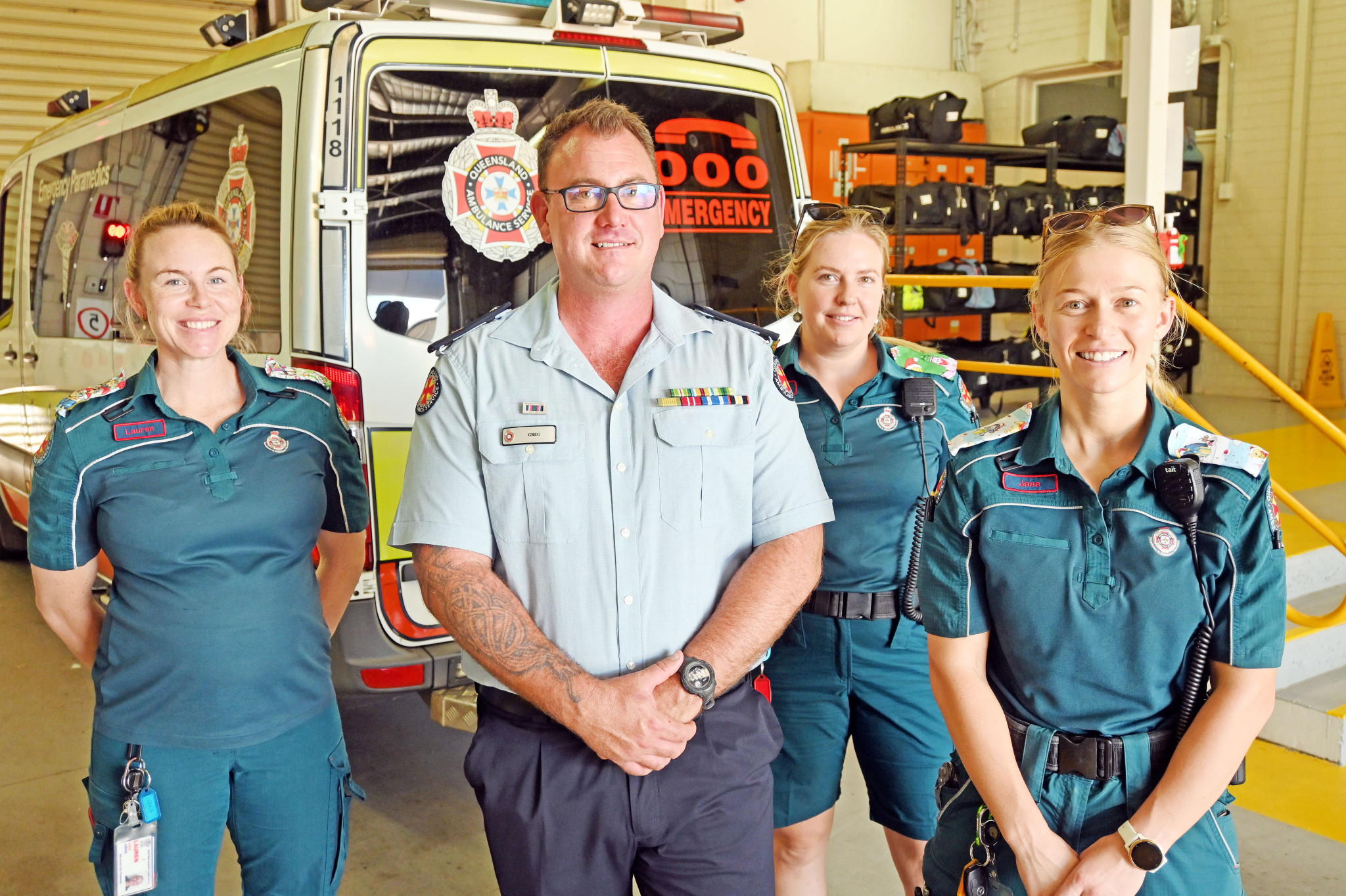 Paramedics Lauren Hamm, Sarah Stone and Jane Herrick with QAS North West District Superintendent Greg Pride in Mount Isa.