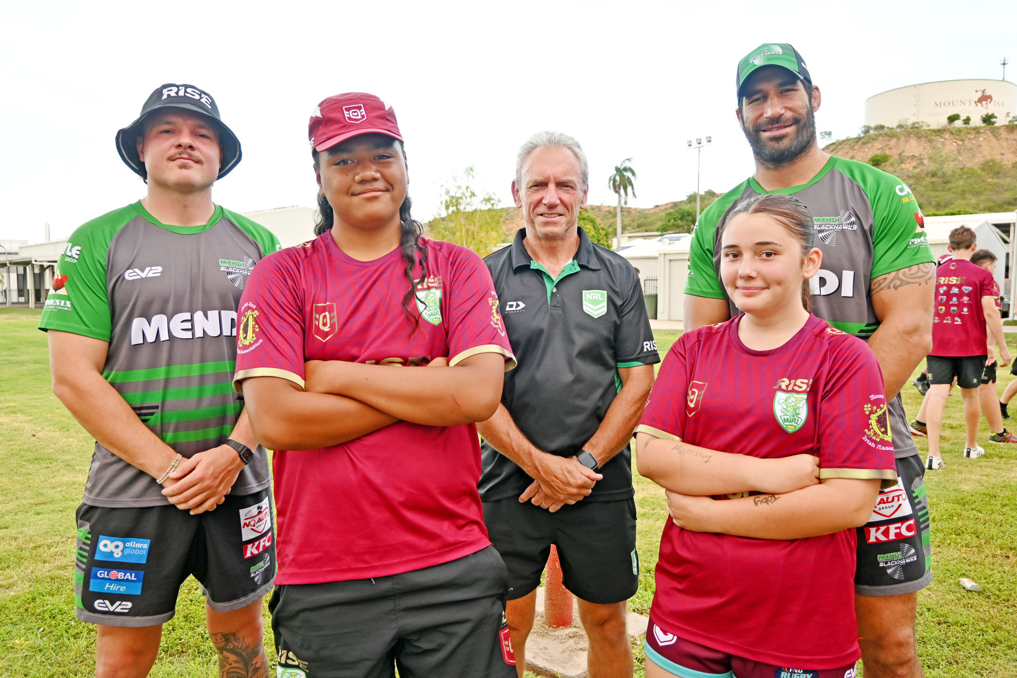 RISE head coach Neil Henry (centre) with Townsville Blackhawks players Jaelen Feeney and James Tamou and Mount Isa RISE participants Prydam Tupou and Asha-Gail Sullivan.