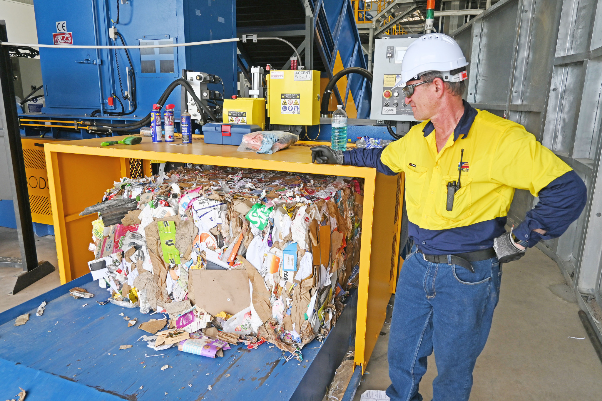 Mount Isa City Council recycling coordinator Richard Auld with an end product bale.