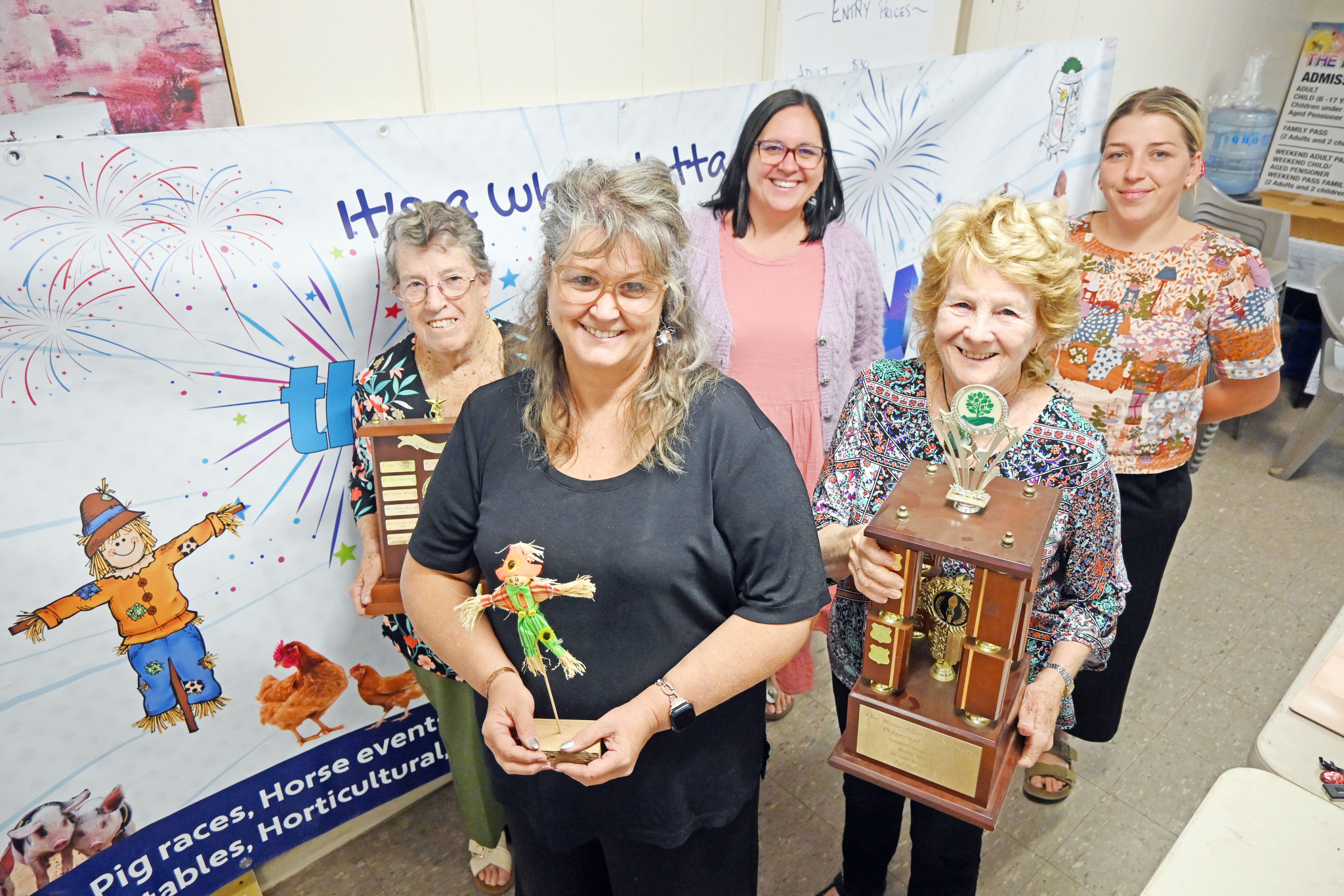 Clutching some of the trophies on offer at the pavilion competition are Mount Isa Agricultural Show Society committee members and event organisers Edna Russell, Anne Pittis, Georgia Heath, Lorna Fisher and Emma Scott.