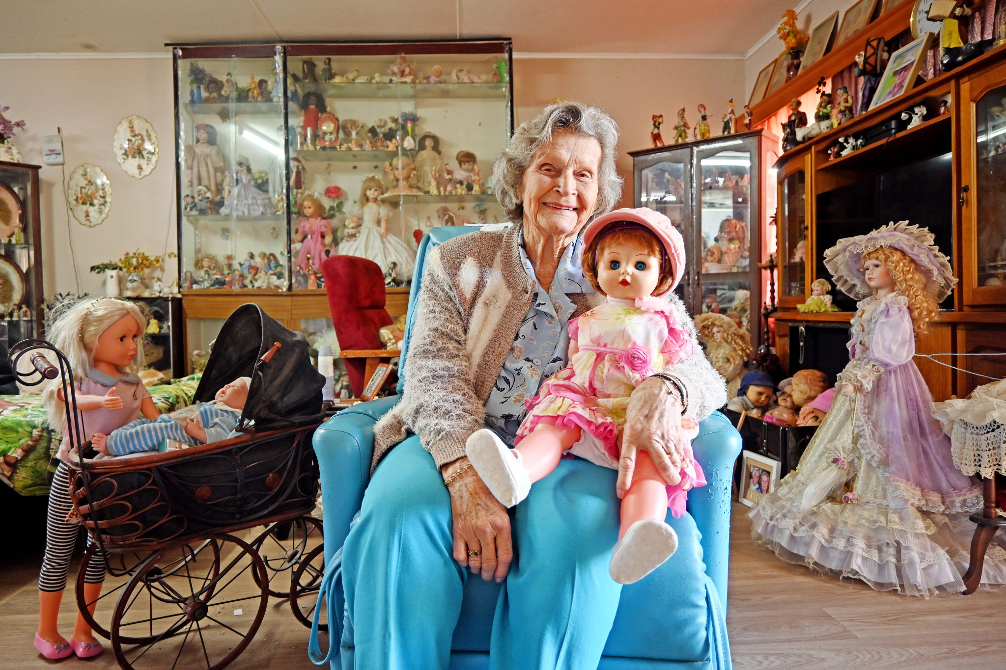 A lifelong collector, Shirley McGuckin presents just one of the many doll displays that are scattered throughout her bedrooms and living room.