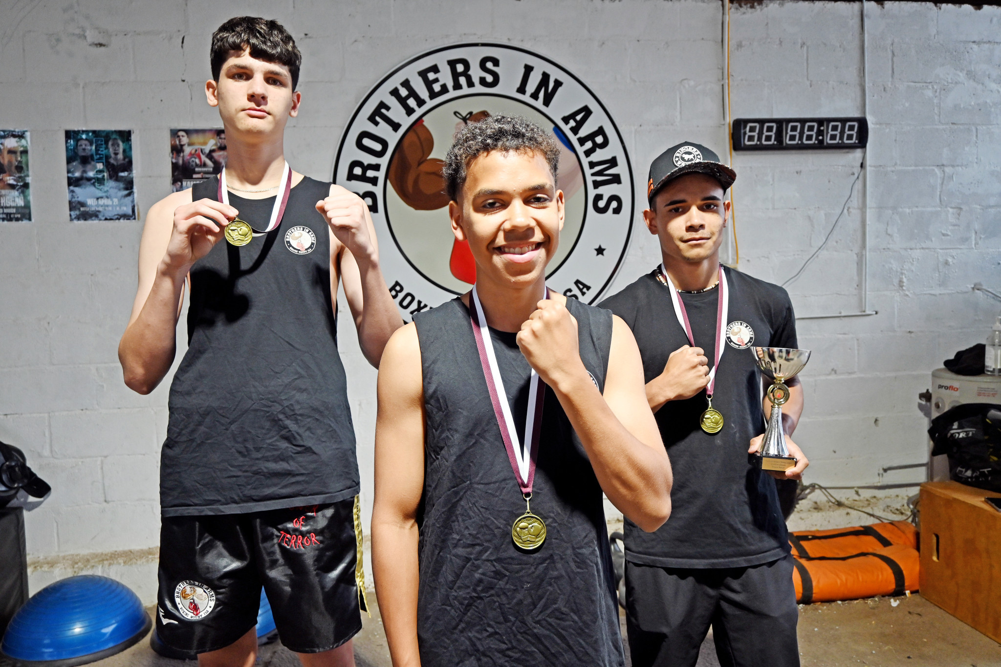 Brothers in Arms fighers Lincoln Peterson, Rashard Radcliffe and Taiarn Yasserie made it a clean sweep at the 2025 Queensland Golden Gloves. Absent from the photo was Jack Wehrman, who was named top senior fighter in Townsville.
