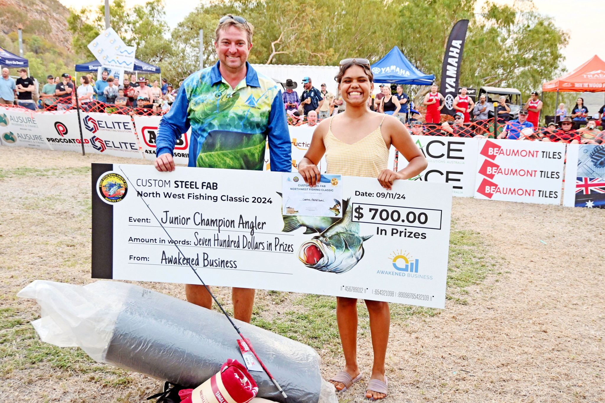 Mick Scotney with champion junior angler Cooper Armstrong.