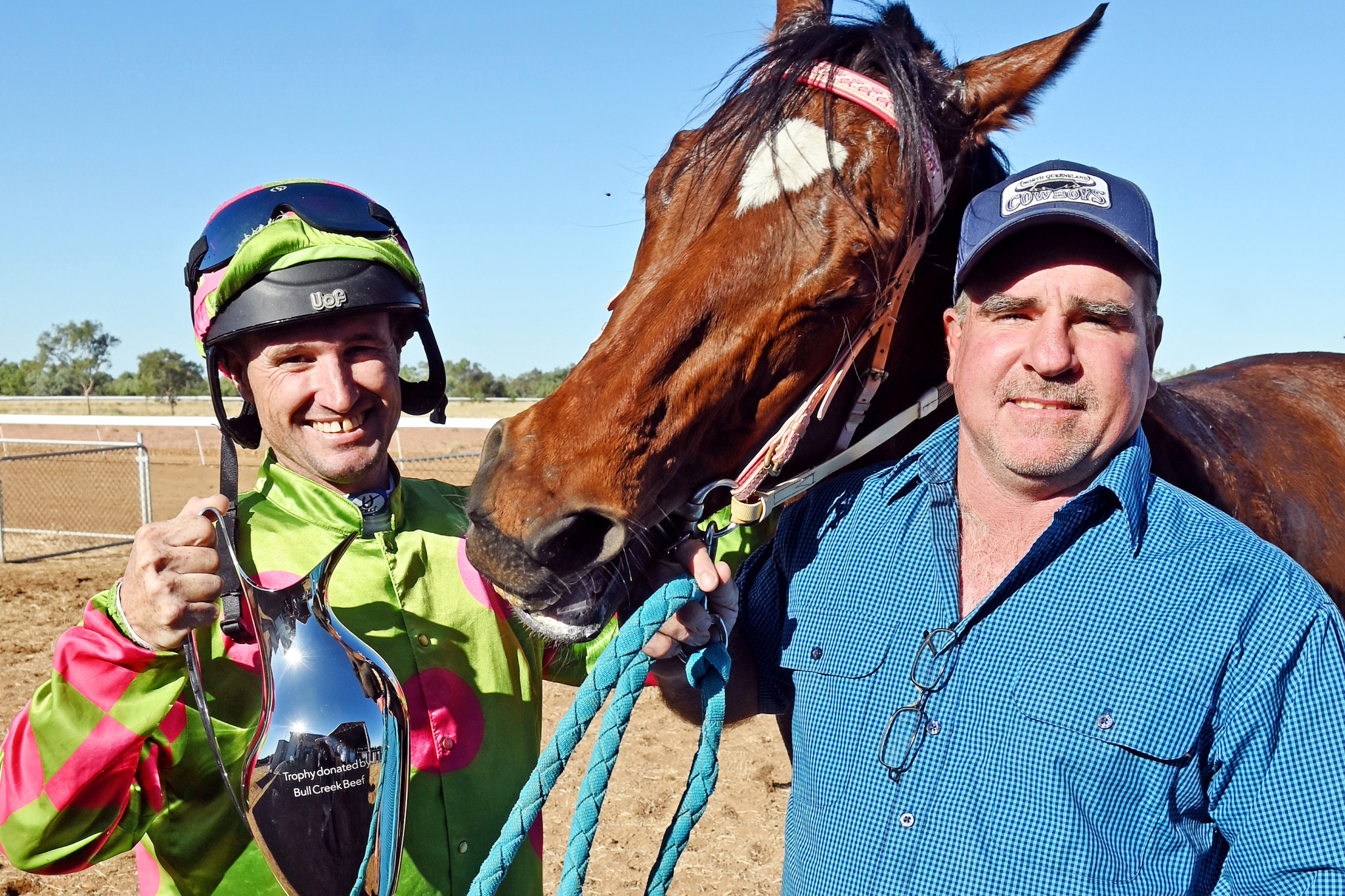 Jockey Micheal McDonald and owner Aaron Spradau after Hang Five’s victory.