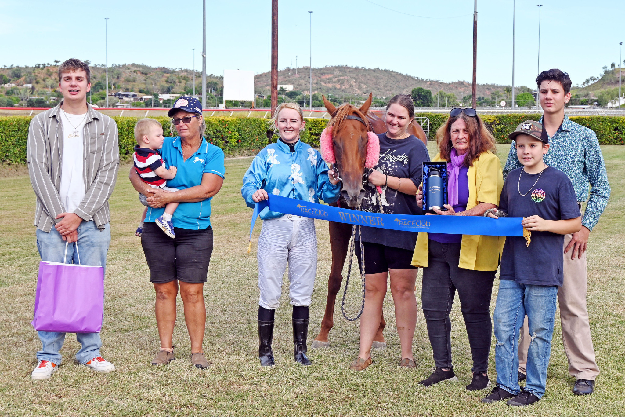 Members of the Crossland family with trainer Tanya Parry and jockey Brooke Stower after Yellowstone Beth won the inaugural Wayne Crossland Memorial.