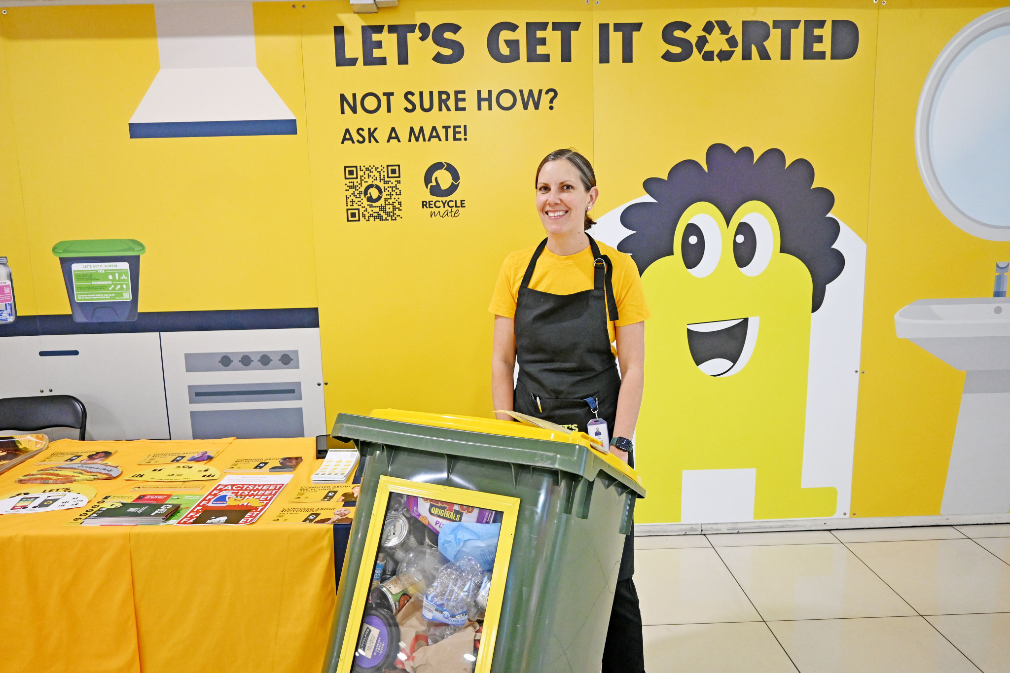 Mount Isa City Council’s education officer for the recycling program, Carly Grubb, has been at Kmart Plaza teaching people about the rollout of recycling.