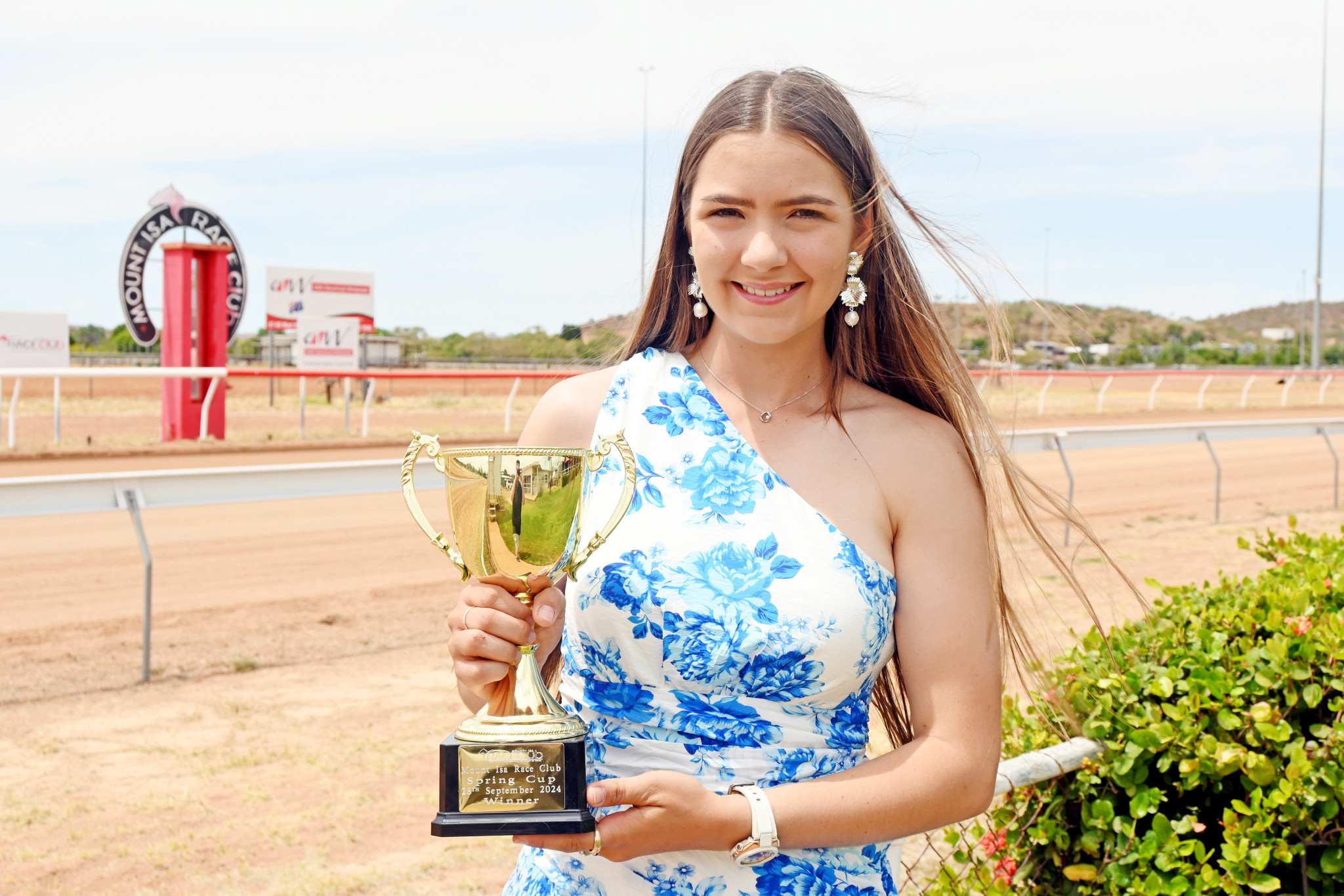 Mackenzie McCulloch holds the Mount Isa Spring Cup ahead of Saturday's meeting.