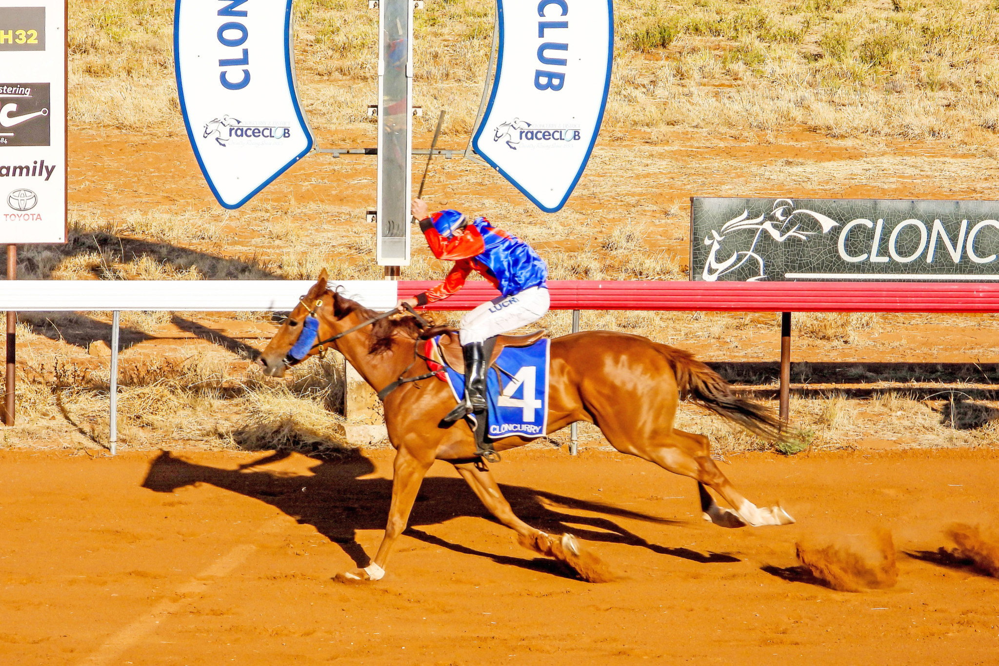 Keith Ballard salutes the crowd after scoring aboard Capiteel for wife Denise in the last race at Cloncurry on Saturday.