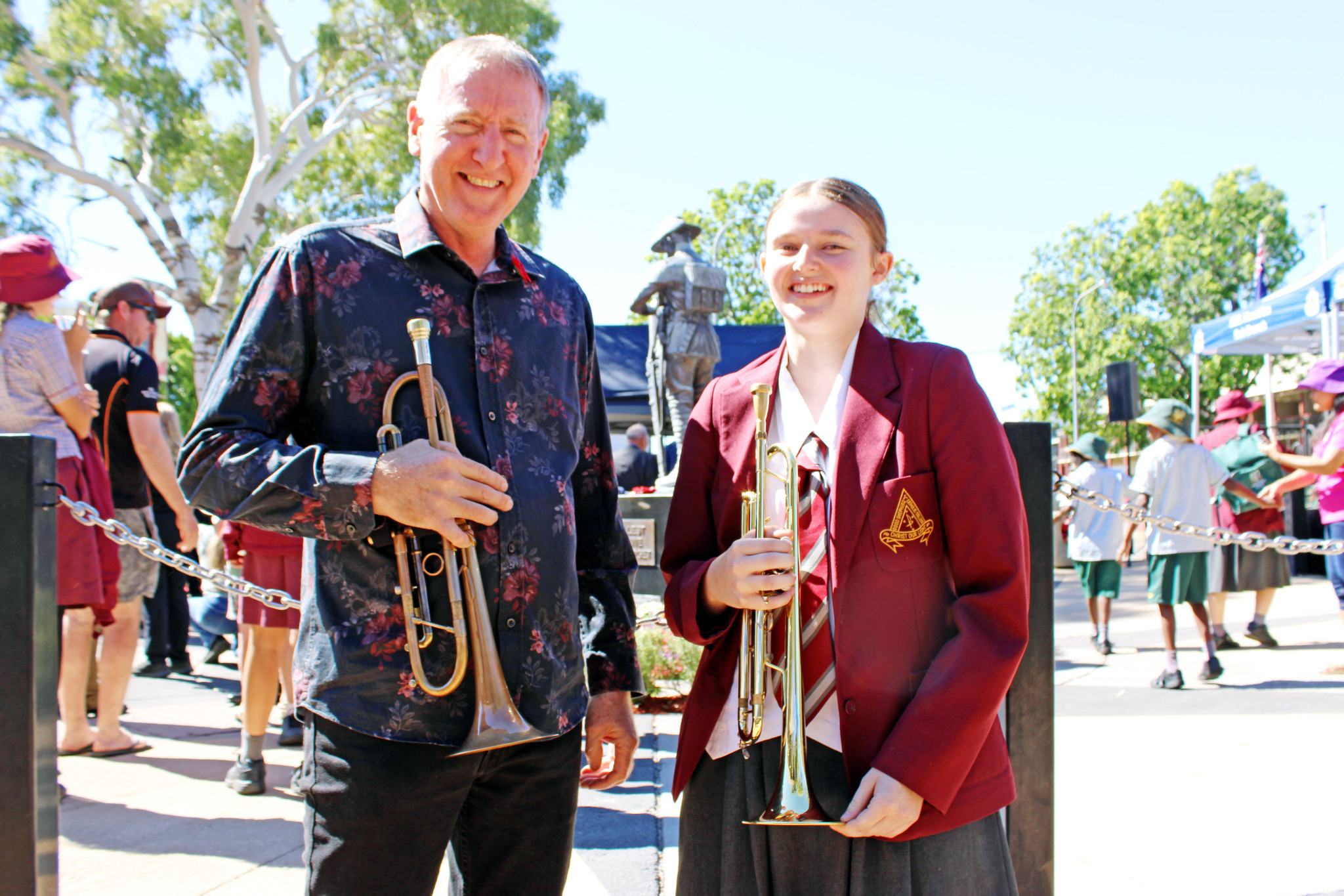 Keith Cox and Holly Greenhalgh after delivering a stirring rendition of the Last Post and the Rouse at the Mount Isa Anzac Day morning service.