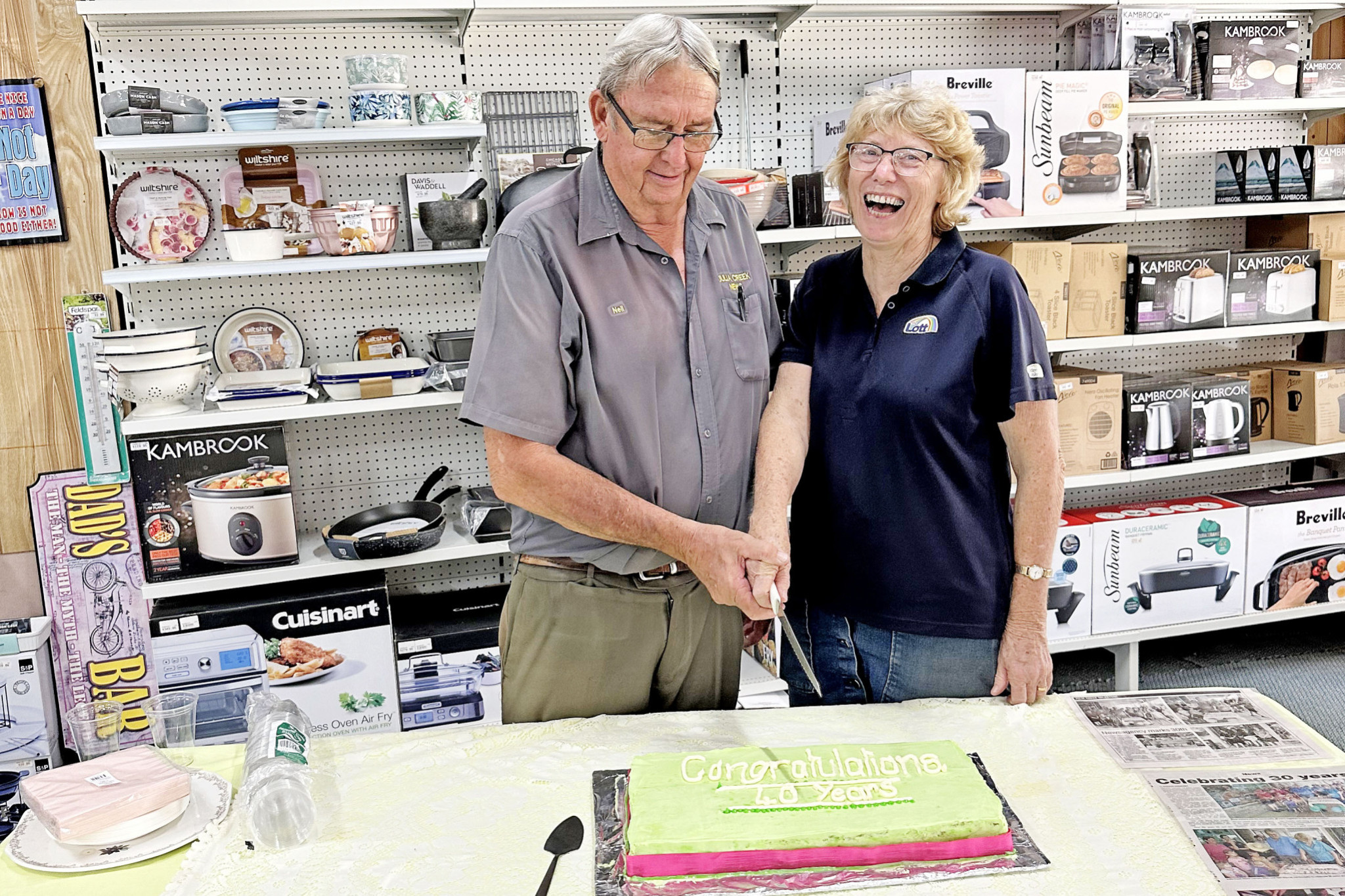 Neil and Ellen Warner cut the cake to mark 40 years since purchasing Julia Creek News. The couple invited friends and old employees to a special morning tea last Tuesday to mark the milestone.