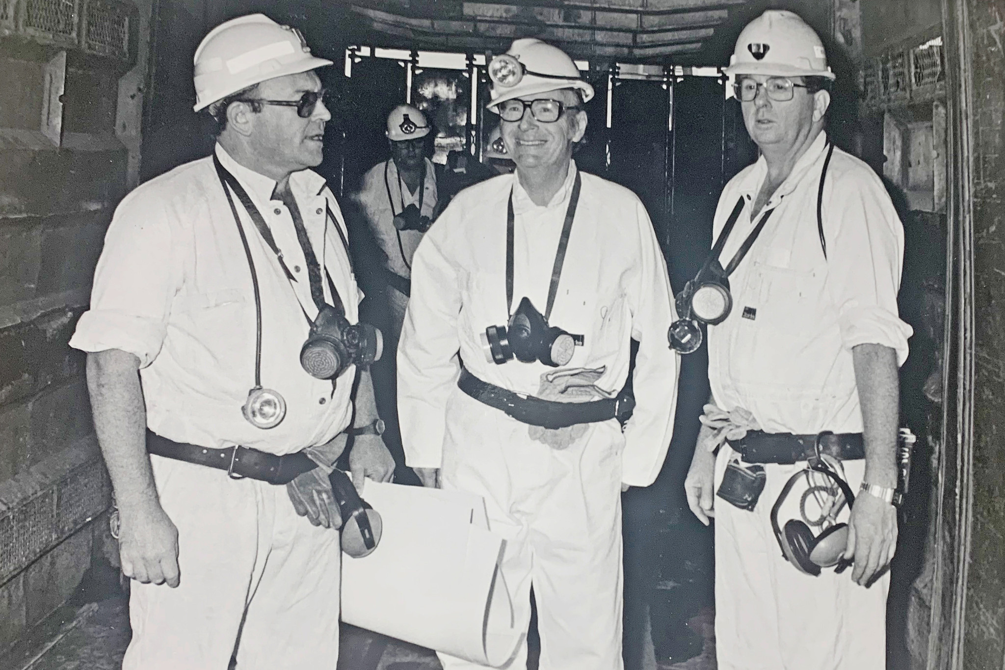 Barry Sullivan (centre) with the President of Ireland, Dr Patrick Hillery, and then Mount Isa Mines boss Tony White, preparing to go underground.