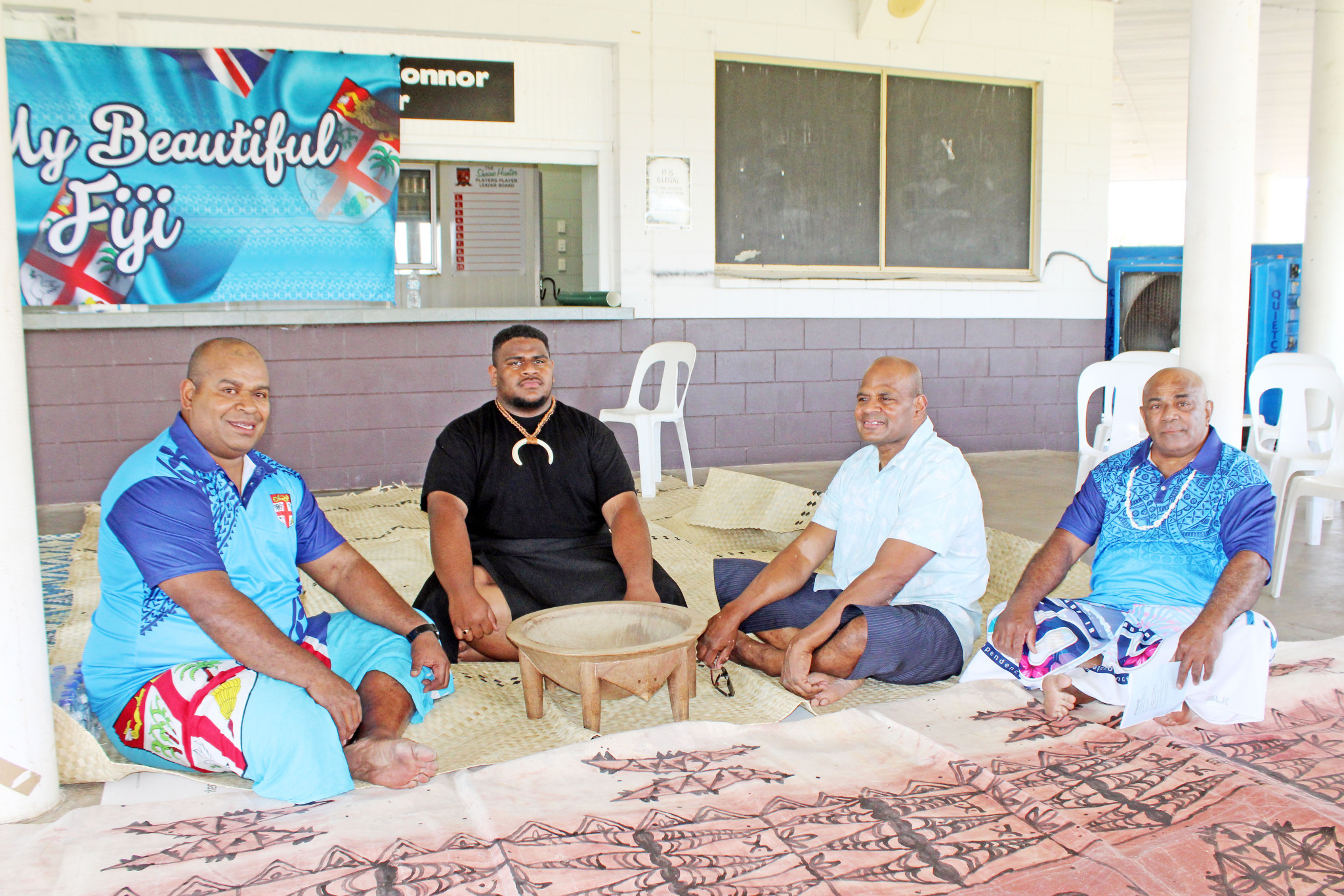 Sisa Meo, Jay Rasova, Mala Rasova and Elia Sikiwaq with a kava bowl.