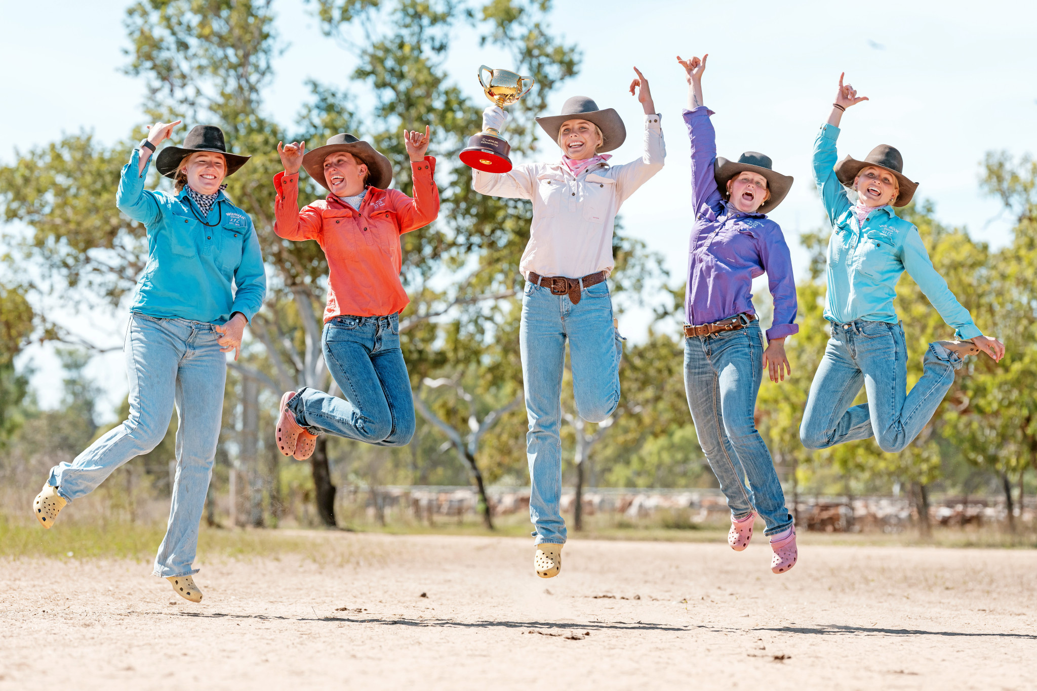 Jillaroos Katie Anderson, Bella Crawford, Lucy Scanlon, Sofie Foster and Cilla Monie jump for joy with the Cup. Picture: JAY TOWN