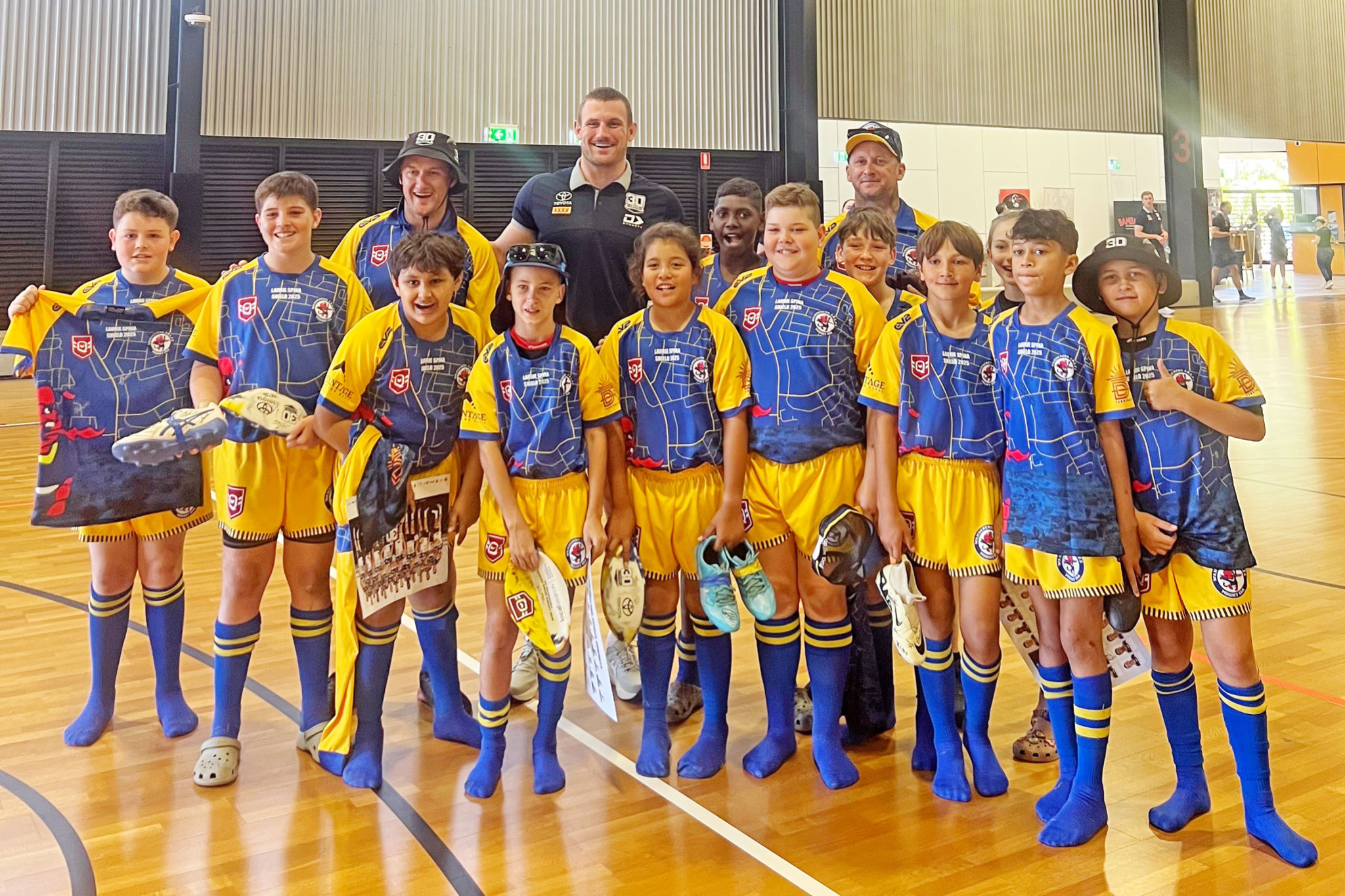 The Wanderers players and coaches with Mount Isa product and Cowboys champion Coen Hess.