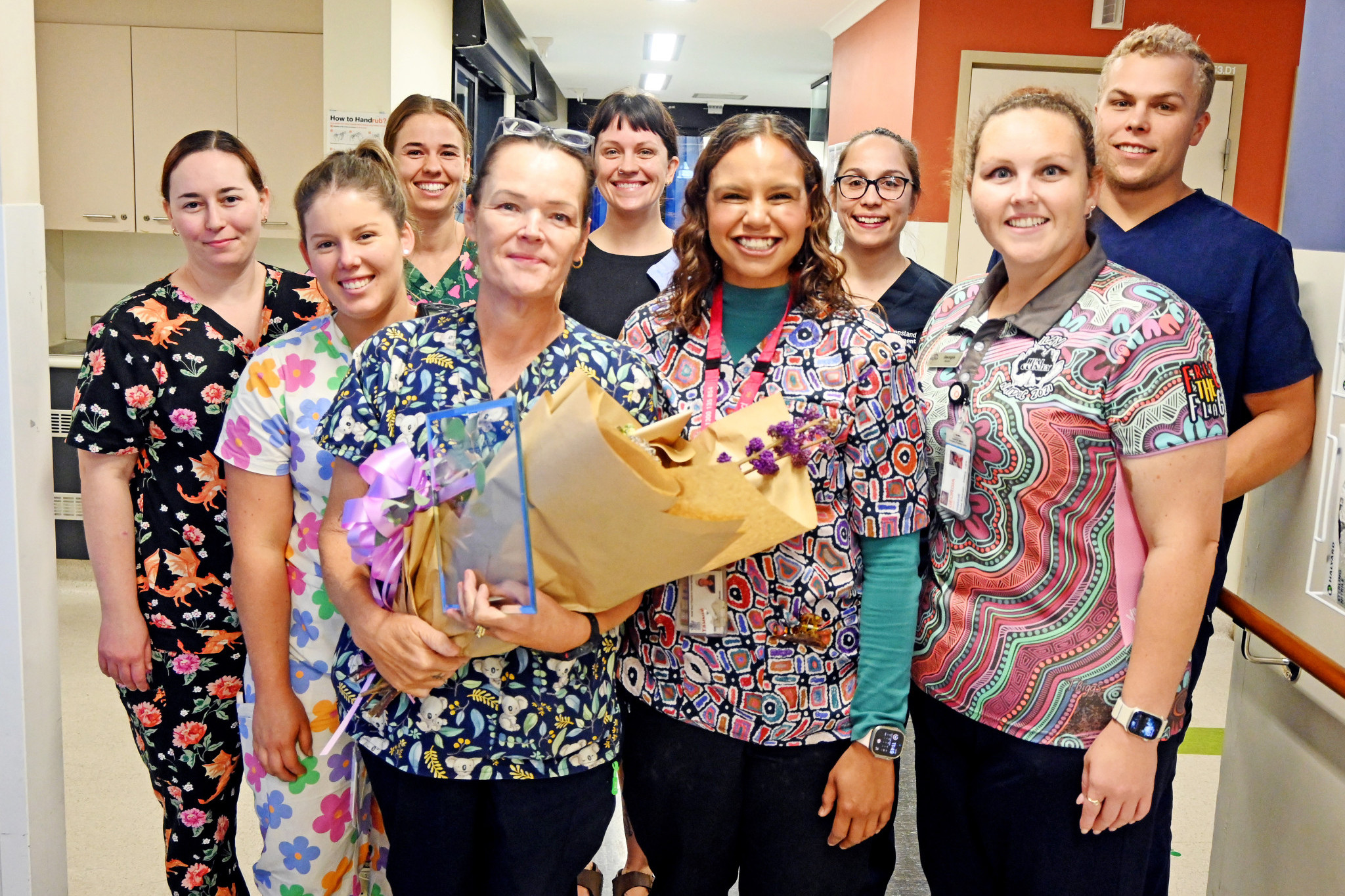 North West Hospital and Health Service’s nurse of the year Tahnia-Maree Ah Kit (fourth from right) with her boss and colleagues at Mount Isa Hospital on Friday.