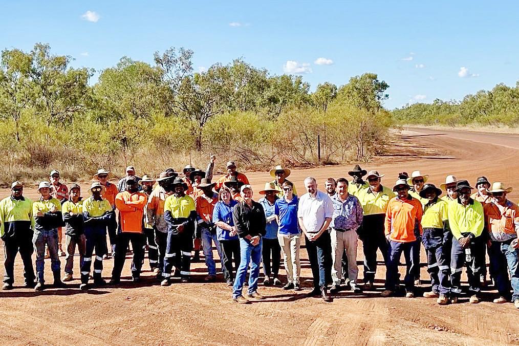 Carpentaria Shire mayor Jack Bawden and Senator Anthony Chisholm with the roadwork crew.