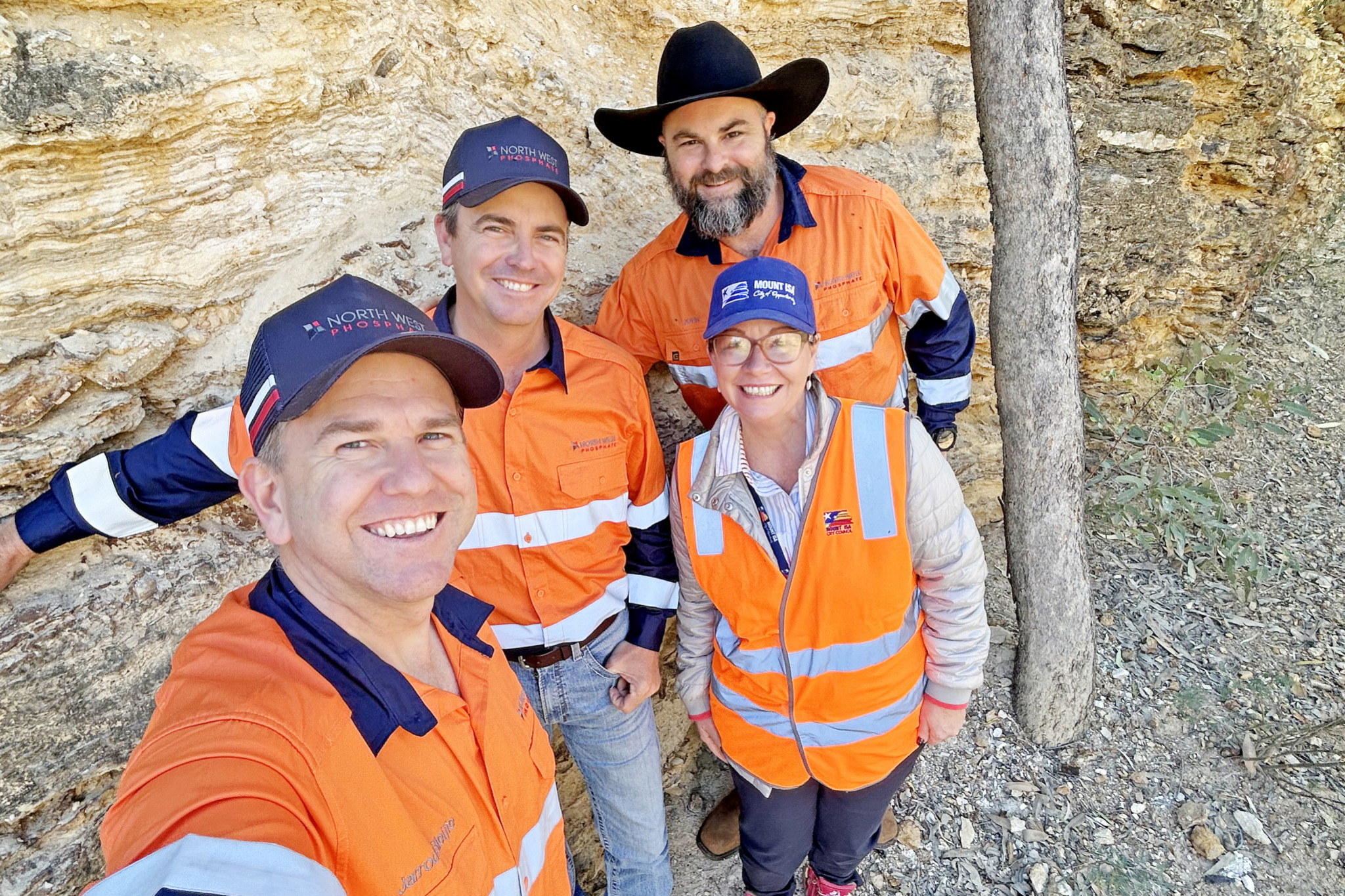 Queensland Deputy Premier and Minister for State Development Jarrod Bleijie takes a selfie with Assistant Minister Sean Dillon, North West Phosphate managing director John Cotter and Mount Isa mayor Peta MacRae.