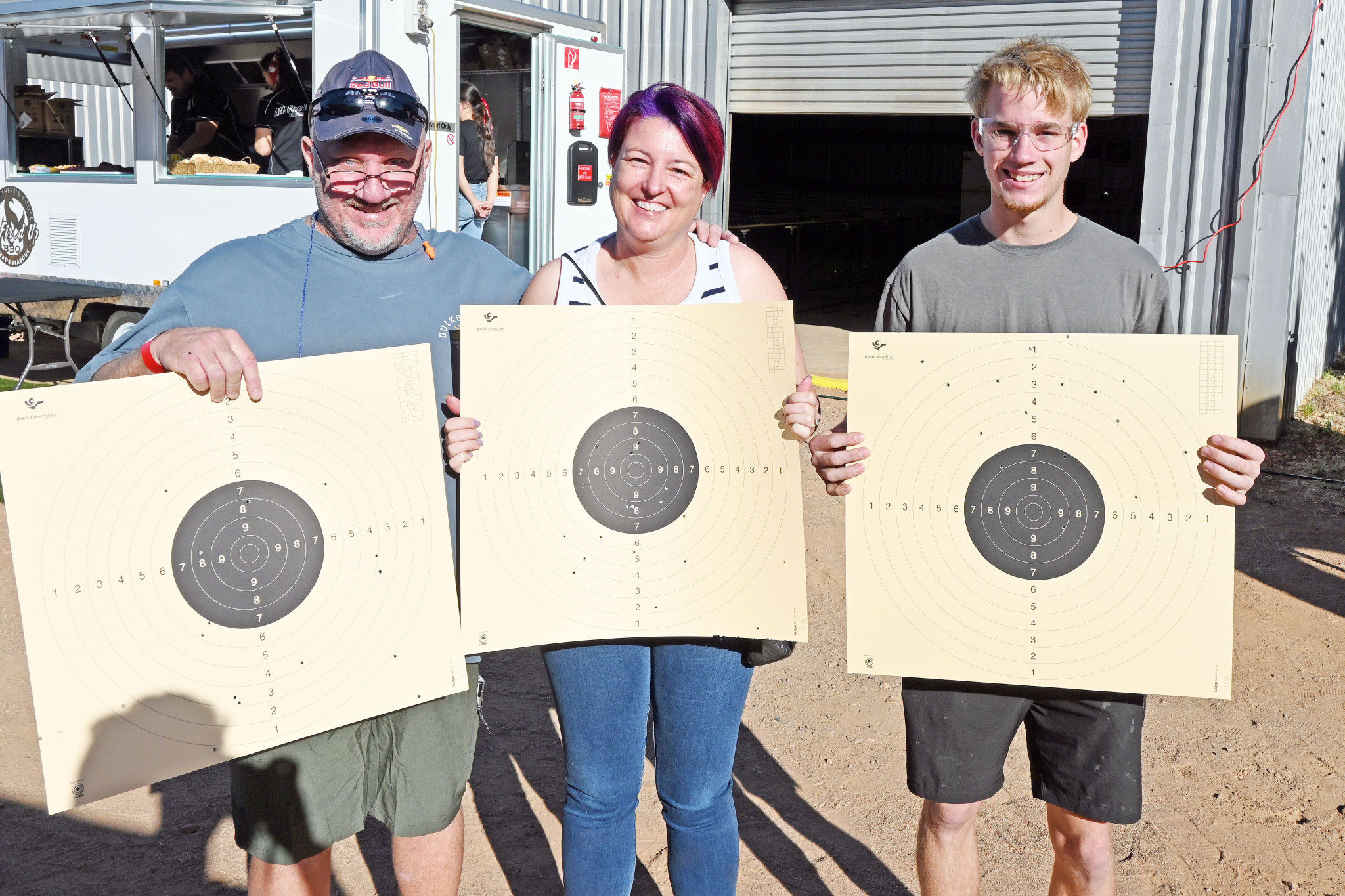 Mark Cullen with Emma and Darcy Harmon – showing off their scores. Mum proved to be the most accurate!