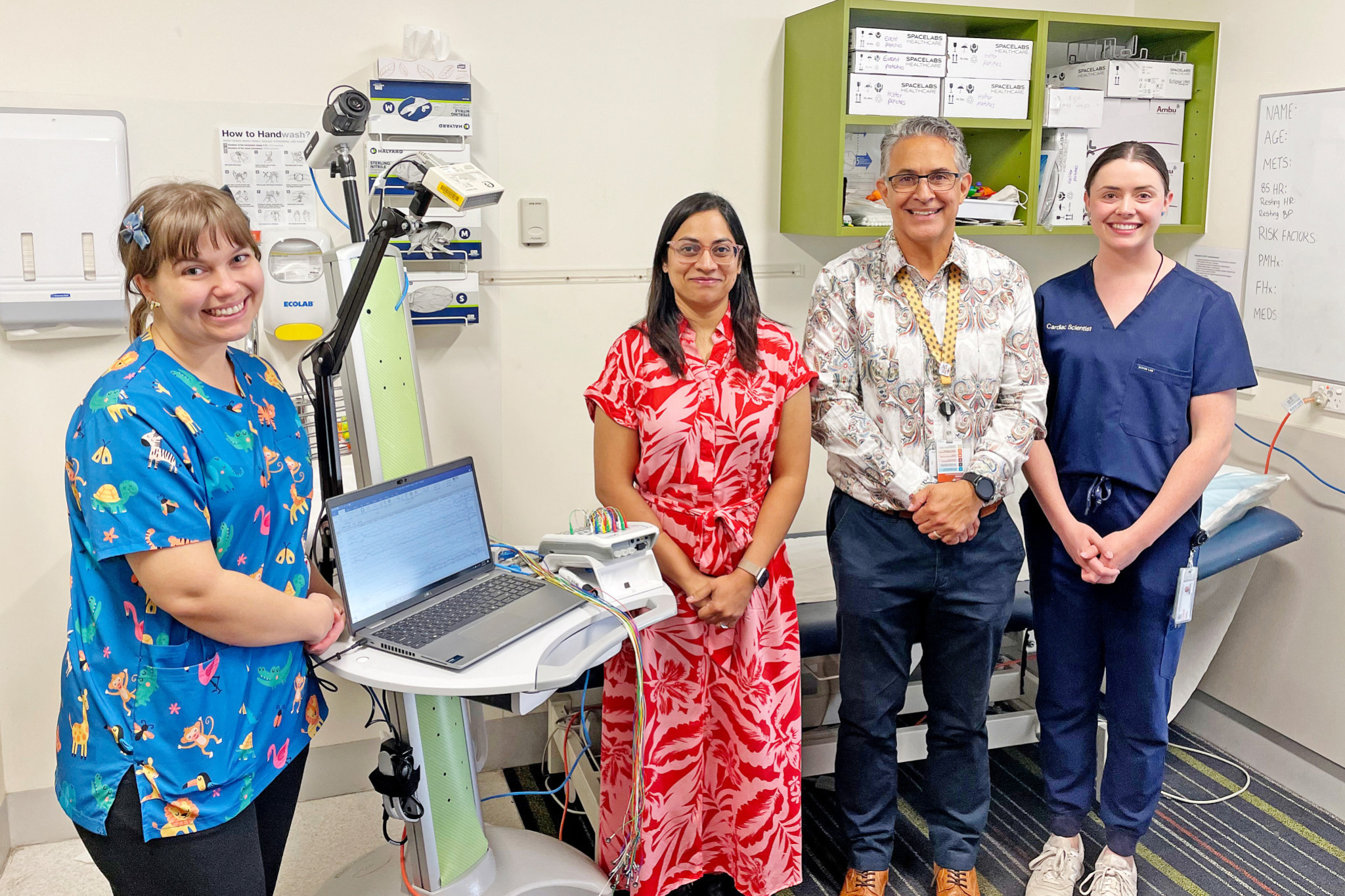 Nurse Breanna, Dr Trupti Jadhay, Dr Viliame Sotutu, and cardiac scientist Lucy O’Neill with the new EEG system at Mount Isa Hospital.