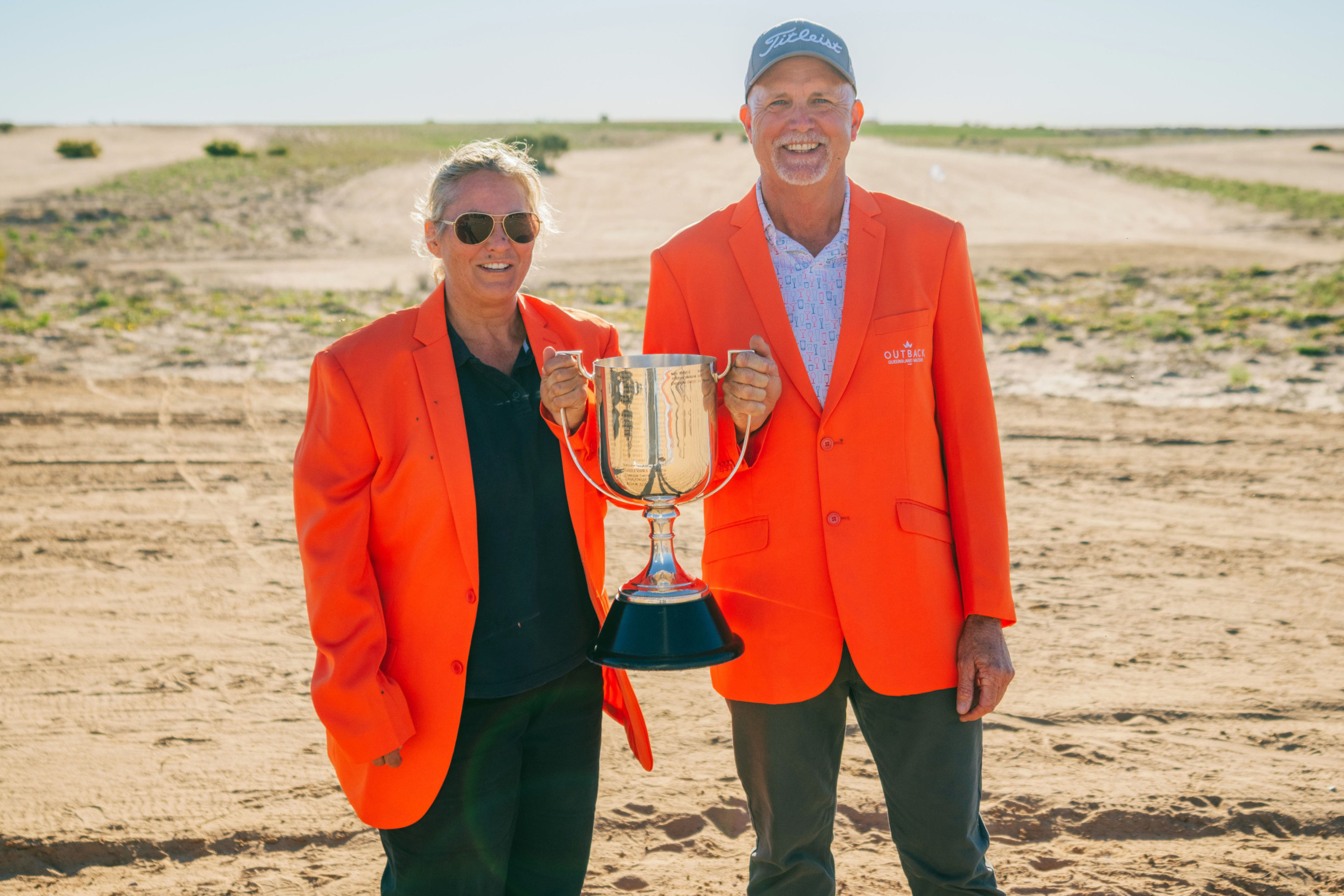 Orange jacket winners Wendy Bodkin and Garry Meek.