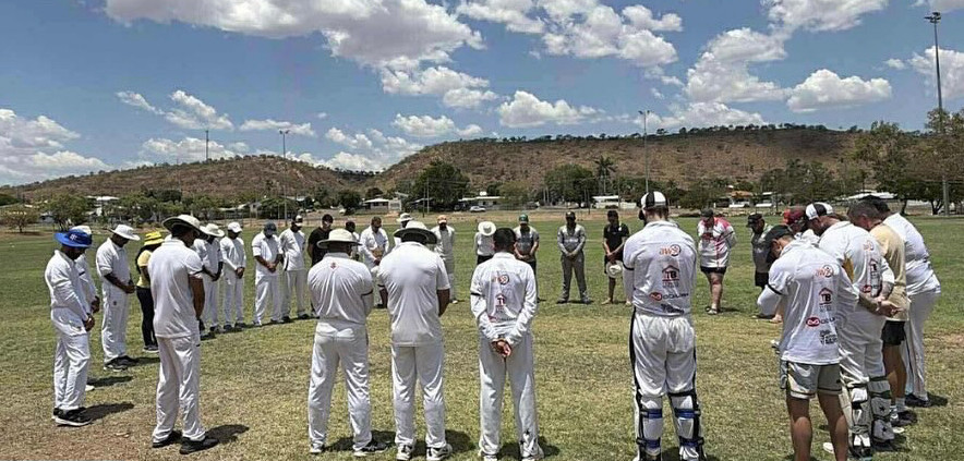 Players from Cavaliers, Panthers, Blackstars and Strikers pause to pay tribute to Ben Austin.
